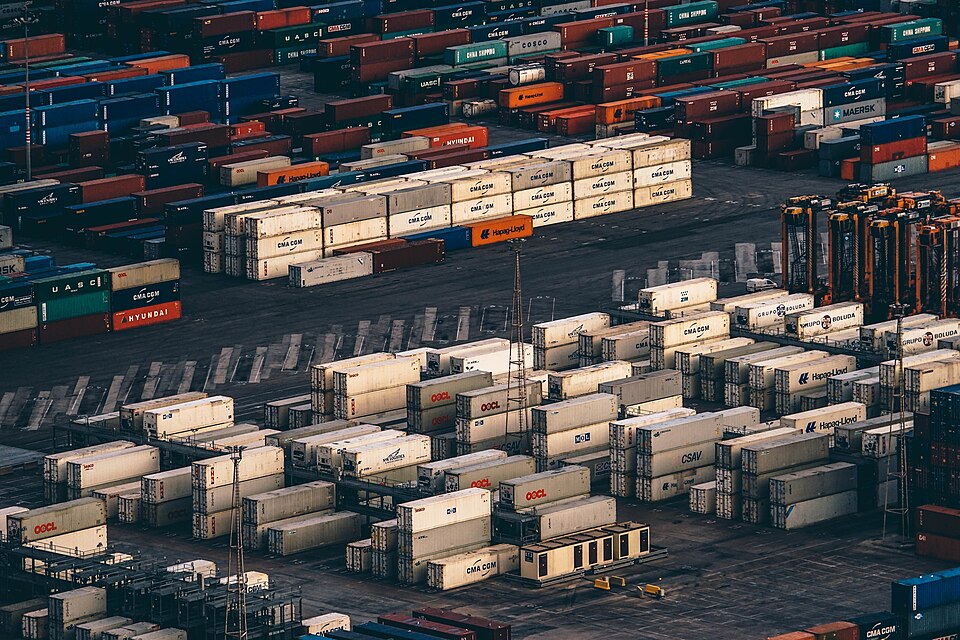 Shipping containers representing export planning and dispatch coordination